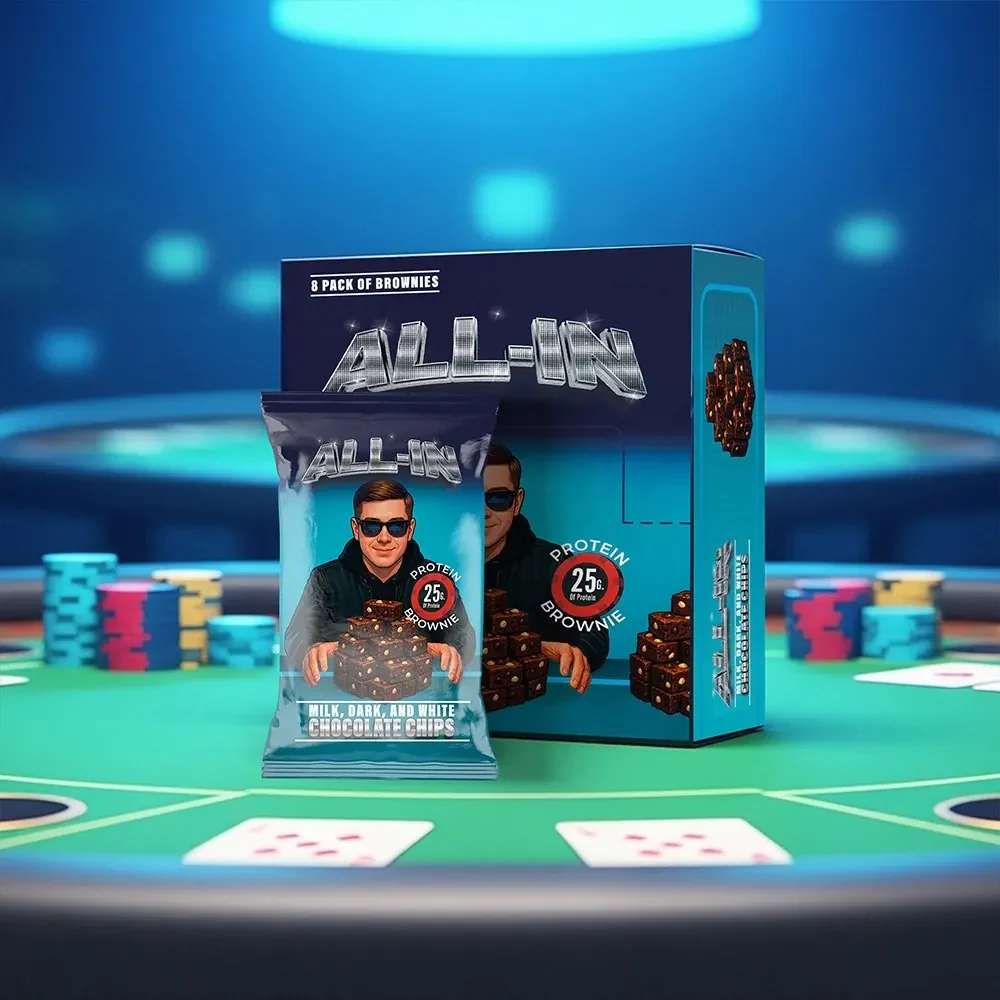 Caja y envoltorio reunidos sobre la mesa de juego.